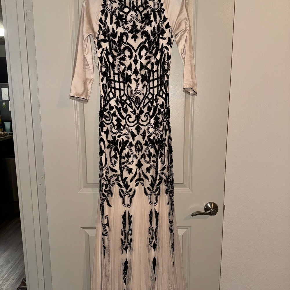Beige and black gown